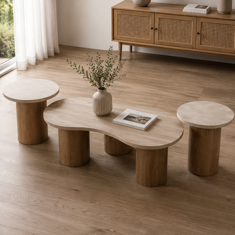 Walnut and beige three-piece coffee table set arranged in a modern living room
